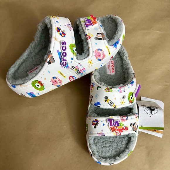 NWT Crocs Disney Parks Holiday Pixar Toy To The World White Slides Sandals - Picture 1 of 7